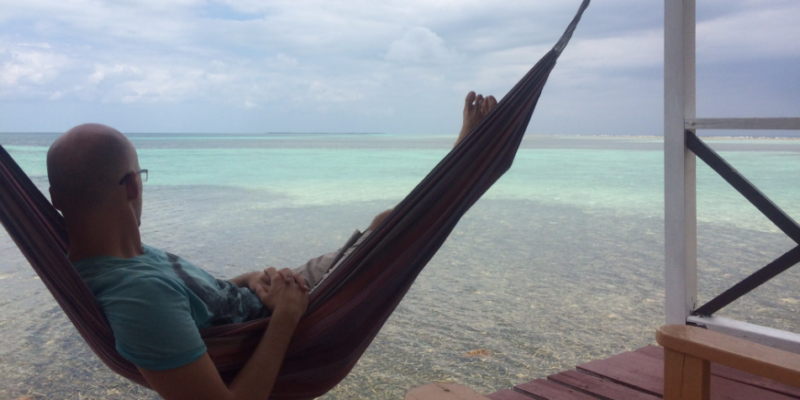 Mike relaxing in a hammock on the beach