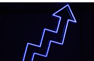 Upward pointing arrow made up of blue neon lights